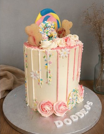 Tall colourful candy drip cake