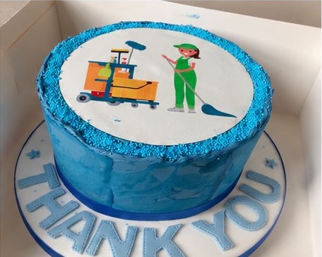 Blue thank-you cake with printed topper